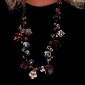 Long brown and clear bead necklace